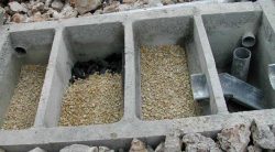 Systeme de filtration des eaux usees avec du sable et du gravier